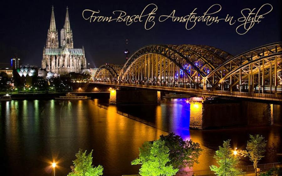 Cologne, Germany at night with the bridge lit up